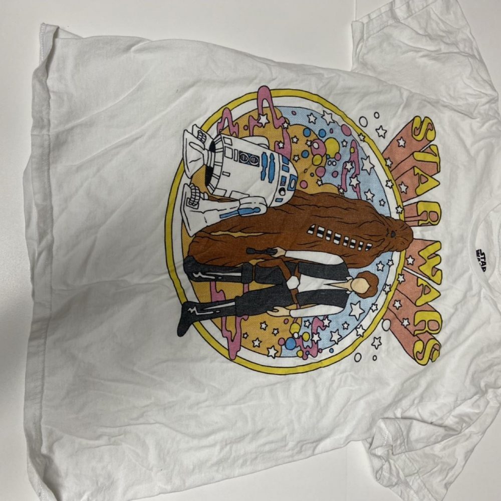 White Star Wars cotton t-shirt with graphic of R2-D2 and Chewbacca with the word